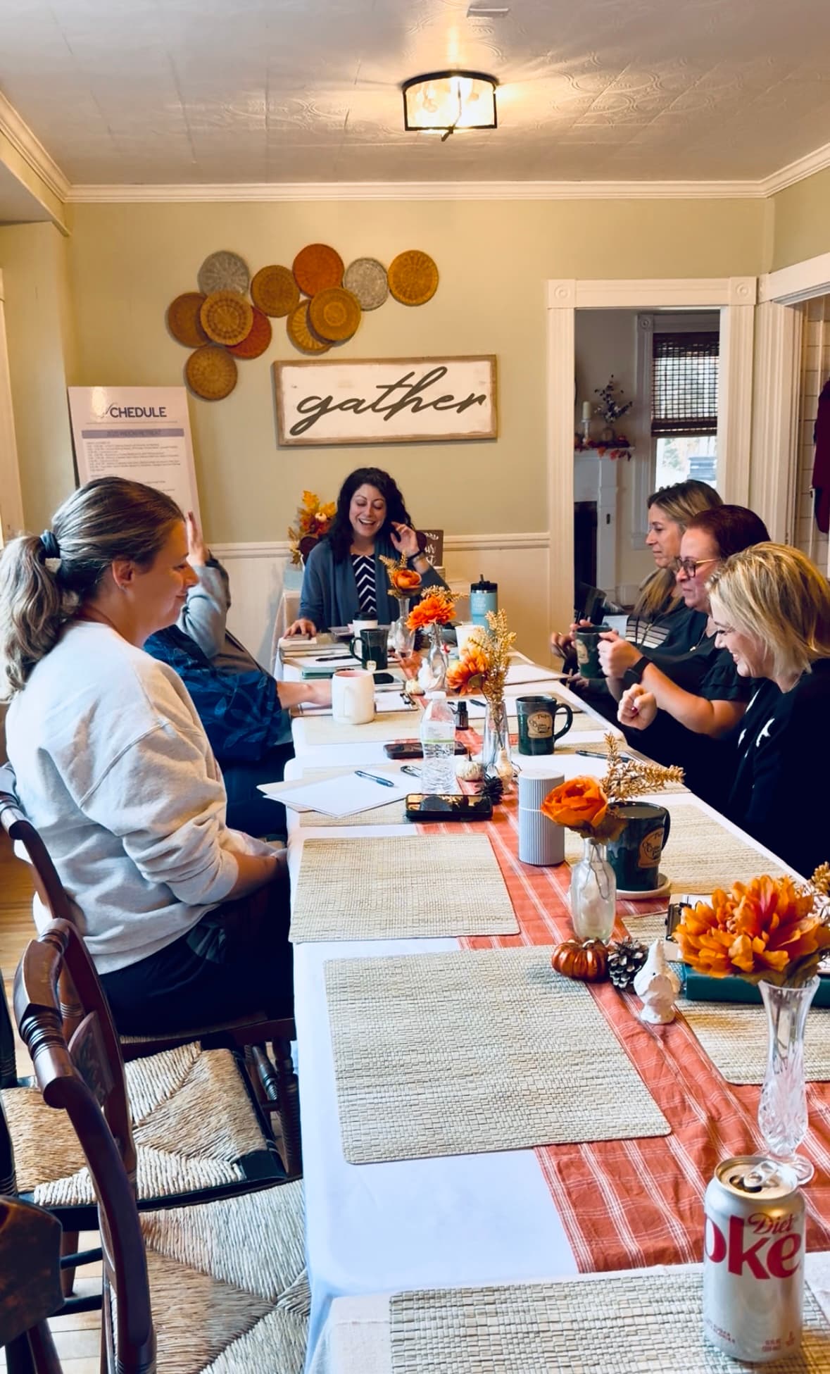 Widows gathered in a warm circle of connection and support
