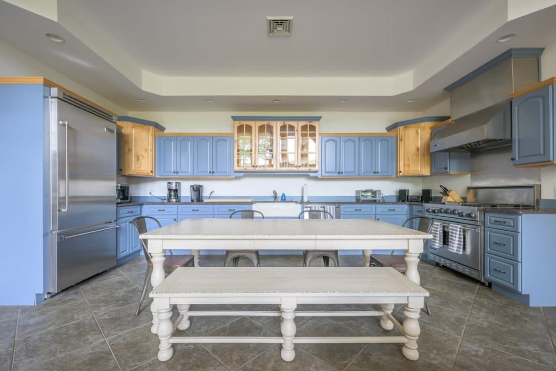 Private chef kitchen with dining table ready for shared meals